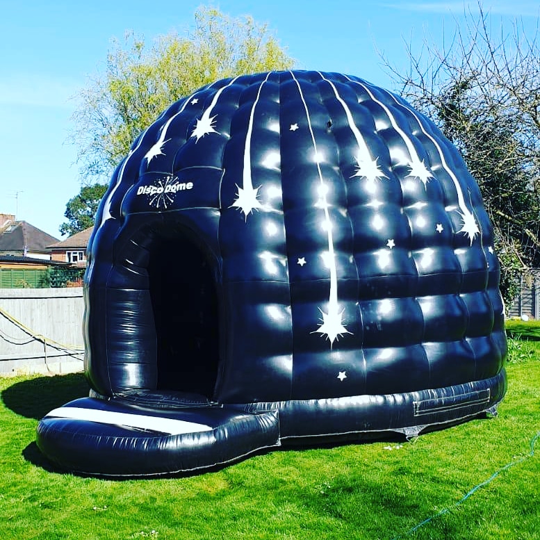 A disco dome-style bouncy castle for hire in Gloucestershire disco dome bouncy castle